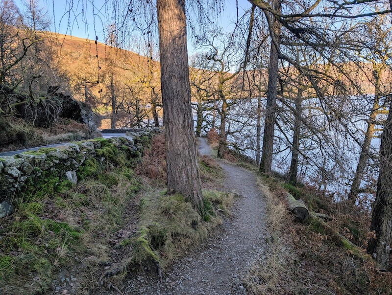The path along the lakeside back to the start - thankfully off-road for the most part and nice to be on flatter ground - © Copyright 2025 Peter Burlingham, Days In The Lakes