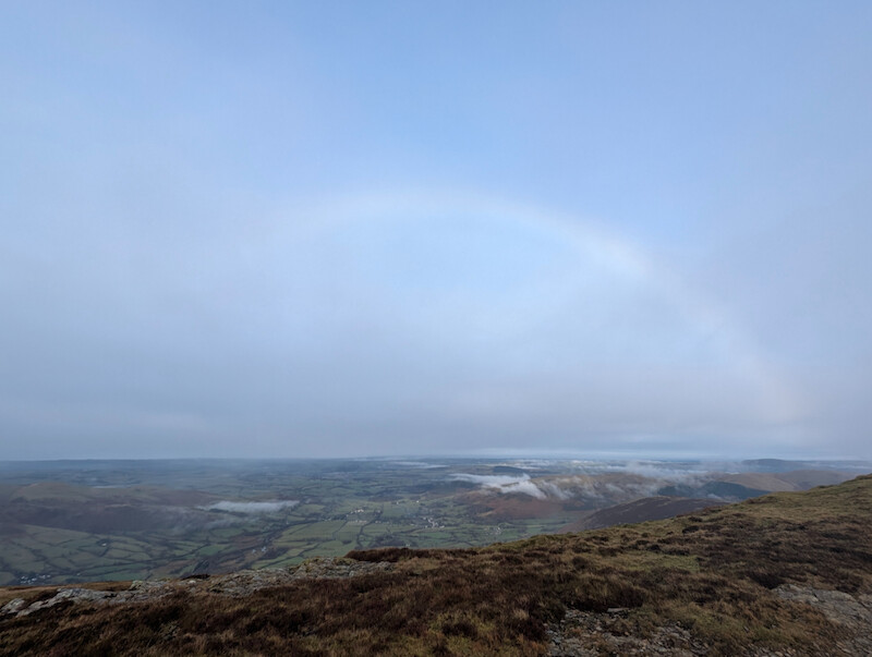 Looking across towards the Solway Firth with a rainbow - © Copyright 2025 Peter Burlingham, Days In The Lakes