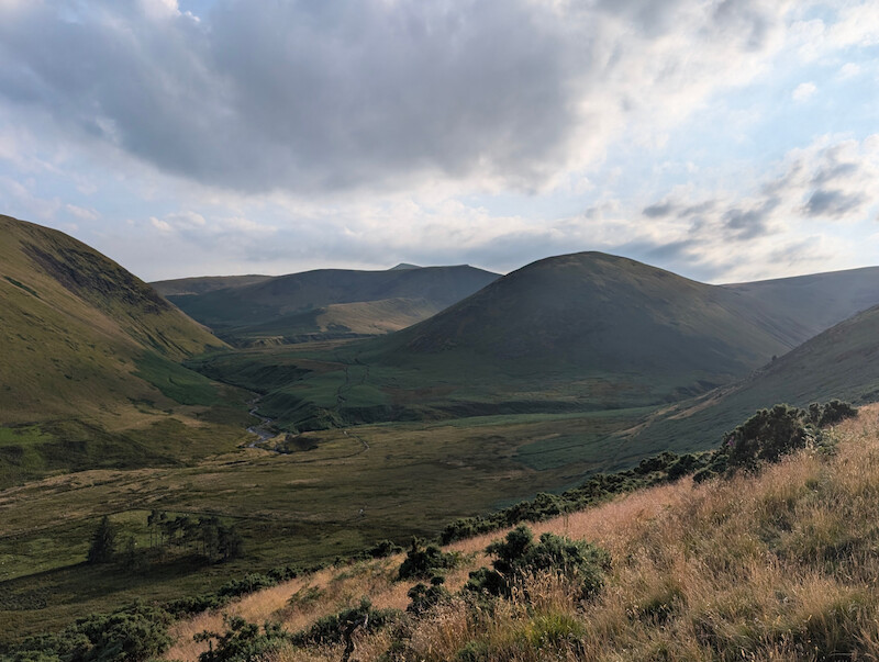 A little more elevation and you can now see the tip of Blencathra right at the back poking up behind Bannerdale Crags with "The Tongue" in front to the right - © Copyright 2025 Peter Burlingham, Days In The Lakes