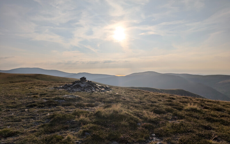 There are a few cairns on this otherwise spongy line heading west - © Copyright 2025 Peter Burlingham, Days In The Lakes