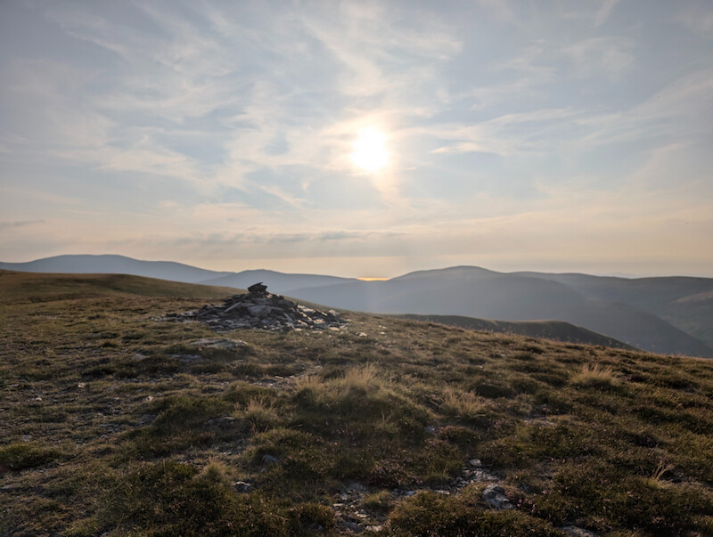 There are a few cairns on this otherwise spongy line heading west - © Copyright 2025 Peter Burlingham, Days In The Lakes