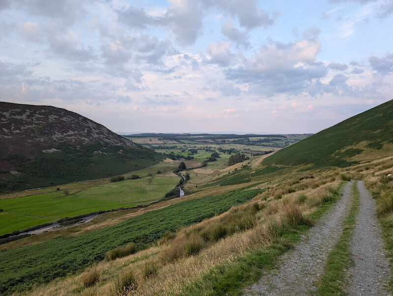 The easy trail back down to the road - © Copyright 2025 Peter Burlingham, Days In The Lakes